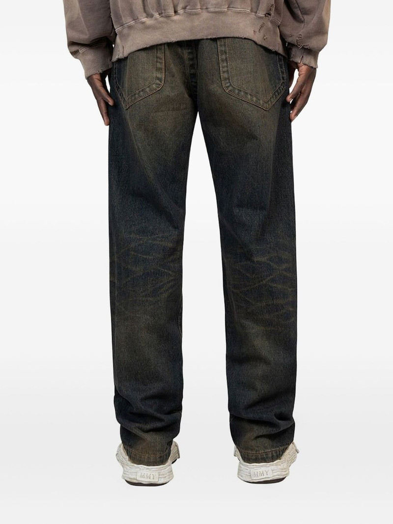 zip-fastening faded jeans 3