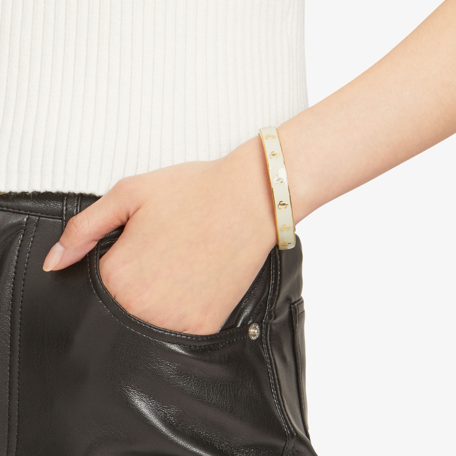 JC Enamel Bangle
Gold-Finish Metal and Latte Enamel JC Bangle - 2