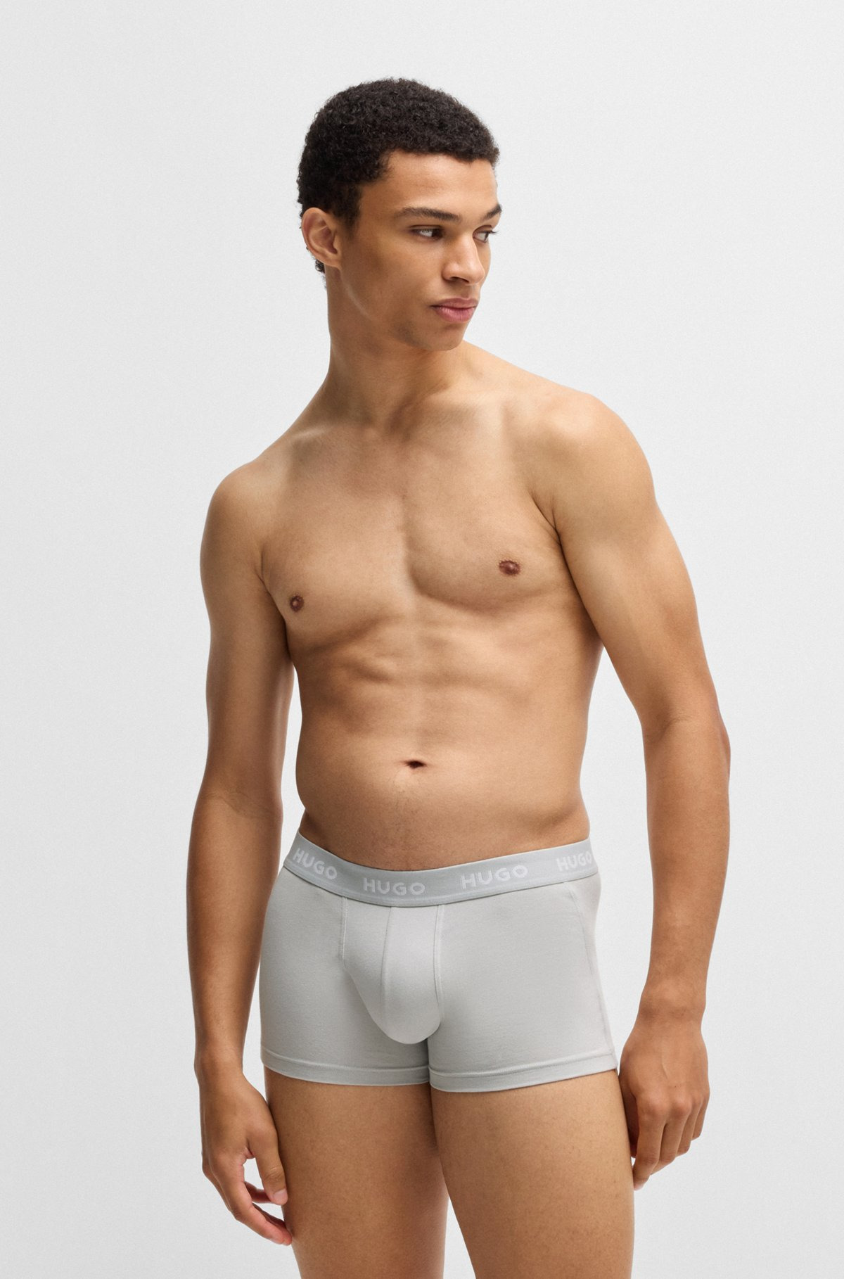 THREE-PACK OF STRETCH-COTTON TRUNKS WITH LOGO WAISTBANDS - 6