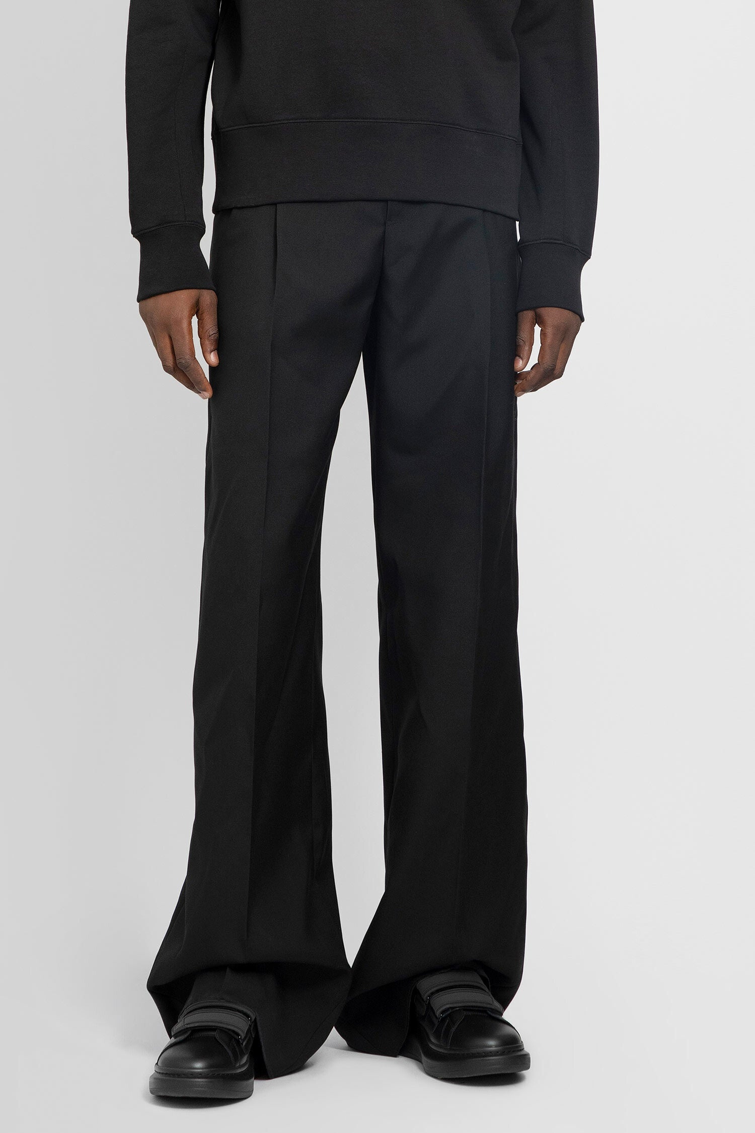 ALEXANDER MCQUEEN MAN BLACK TROUSERS - 1