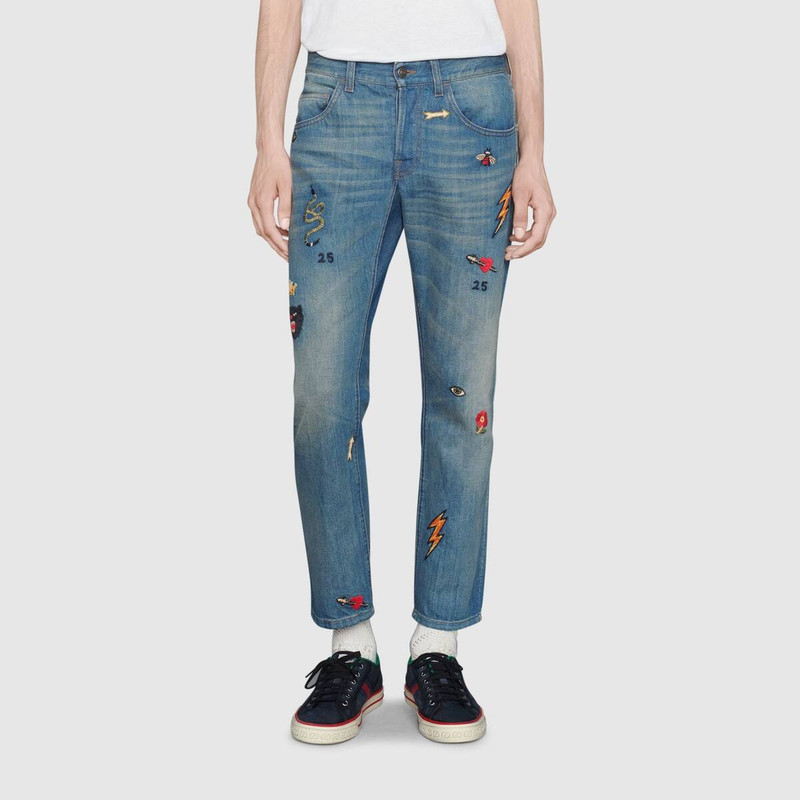 Tapered jeans with symbols  3