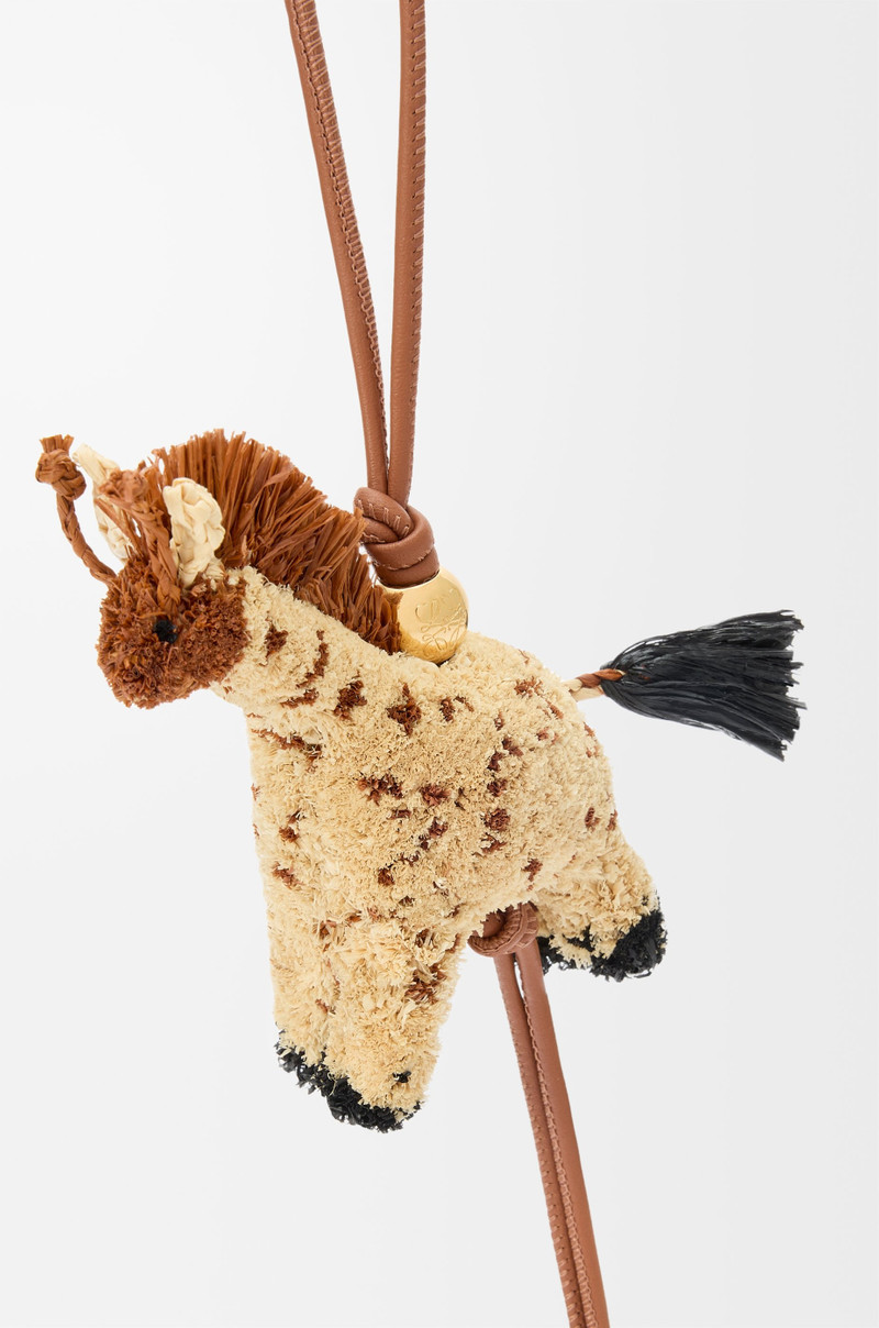Loewe Giraffe charm in raffia and calfskin outlook