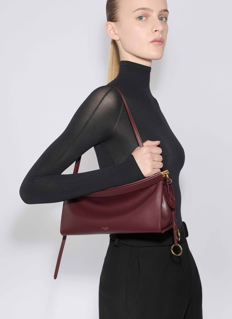 Alaïa LE CLICK EAST WEST MEDIUM BAG IN LEATHER outlook