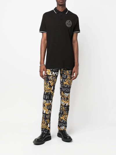 VERSACE JEANS COUTURE logo-baroque print jeans outlook