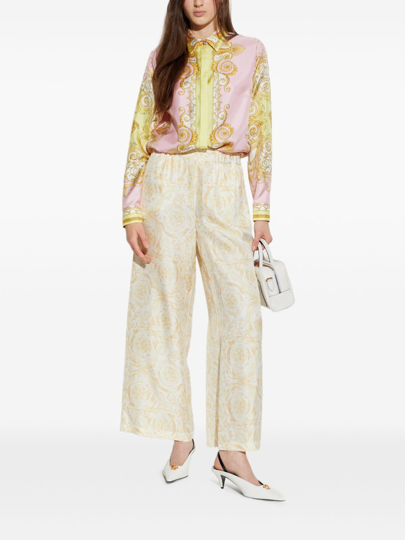 VERSACE floral-patterned trousers outlook