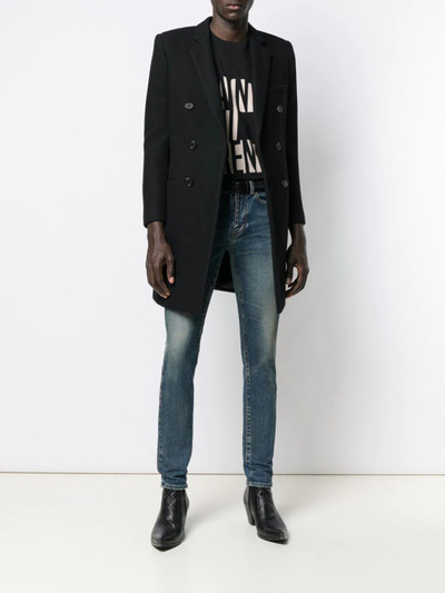 SAINT LAURENT faded-effect blue jeans outlook