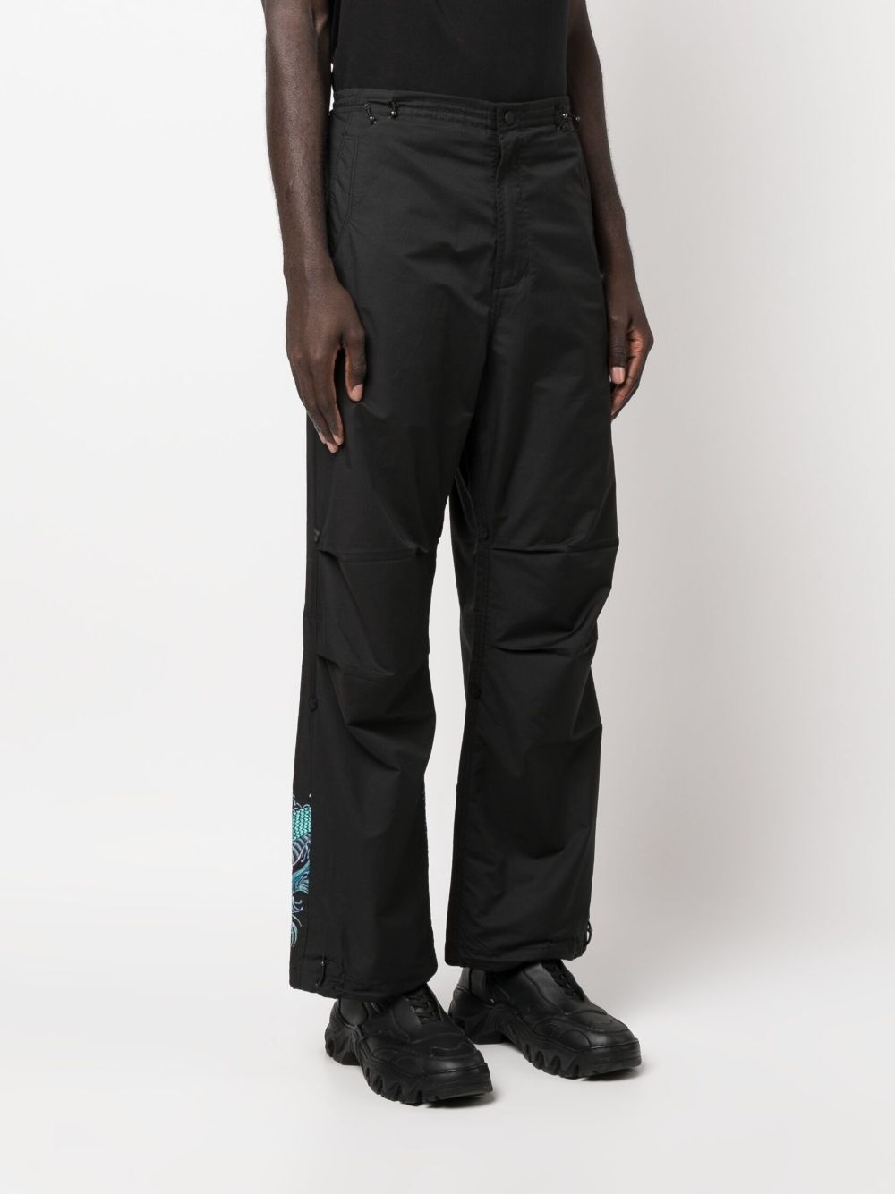 graphic-print trousers - 4