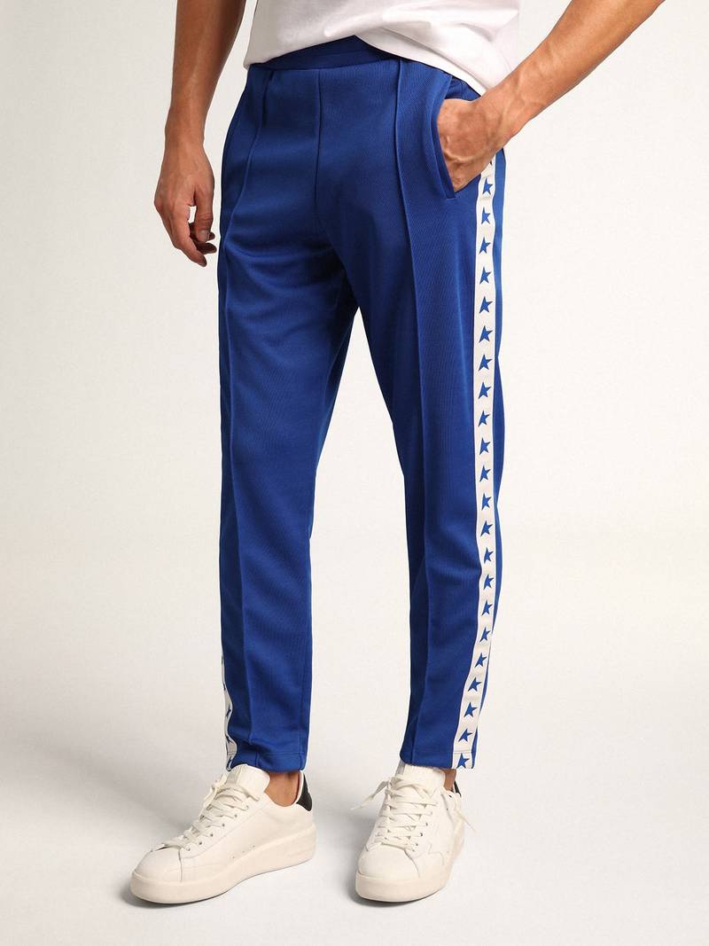 Men's blue joggers with band and stars on the sides 2