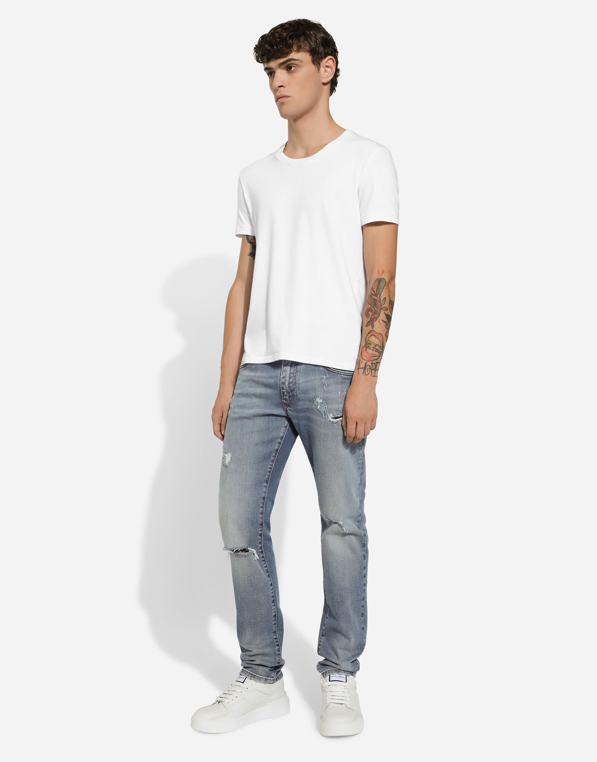 Slim-fit blue stretch denim jeans with abrasions - 5