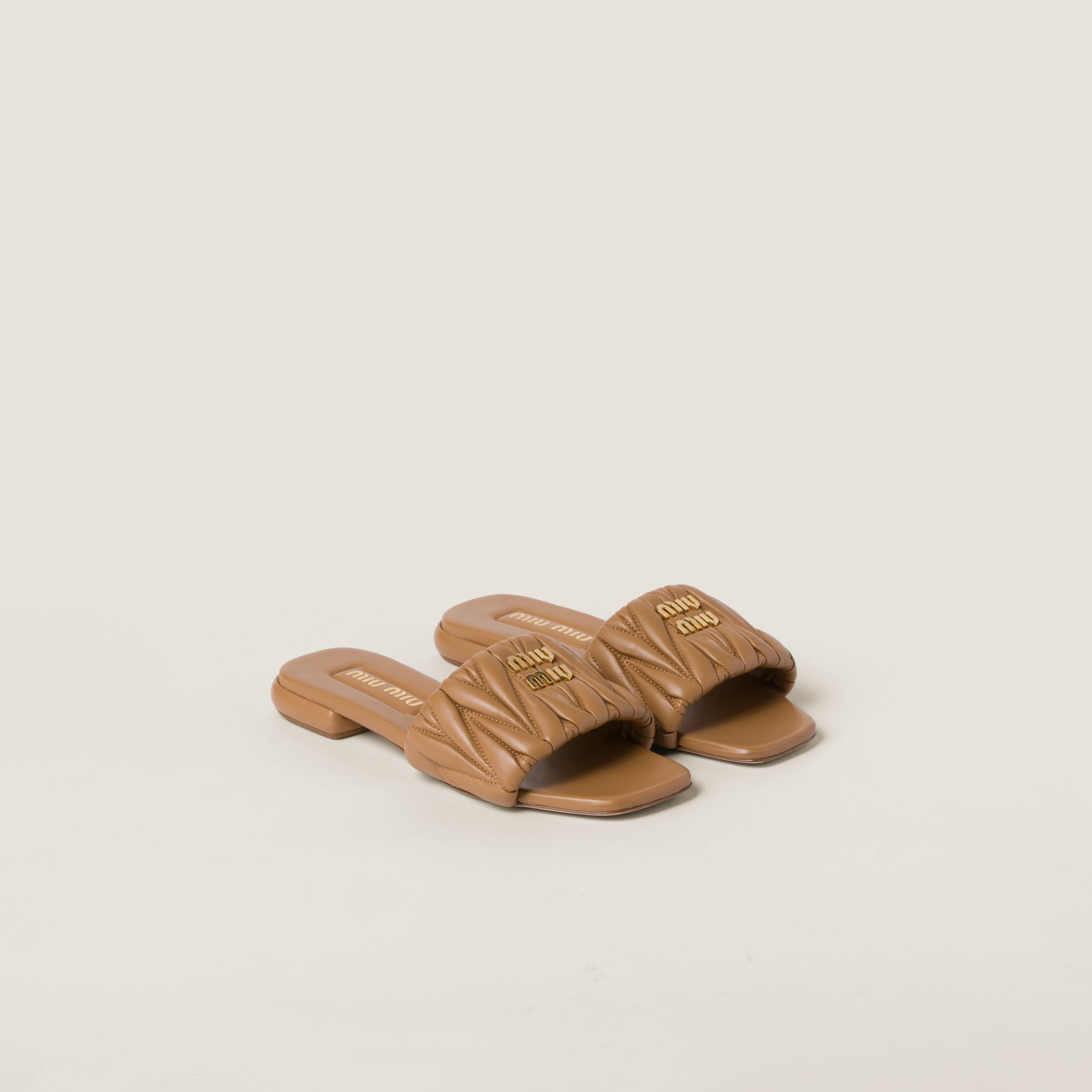 Matelassé nappa leather slides - 1