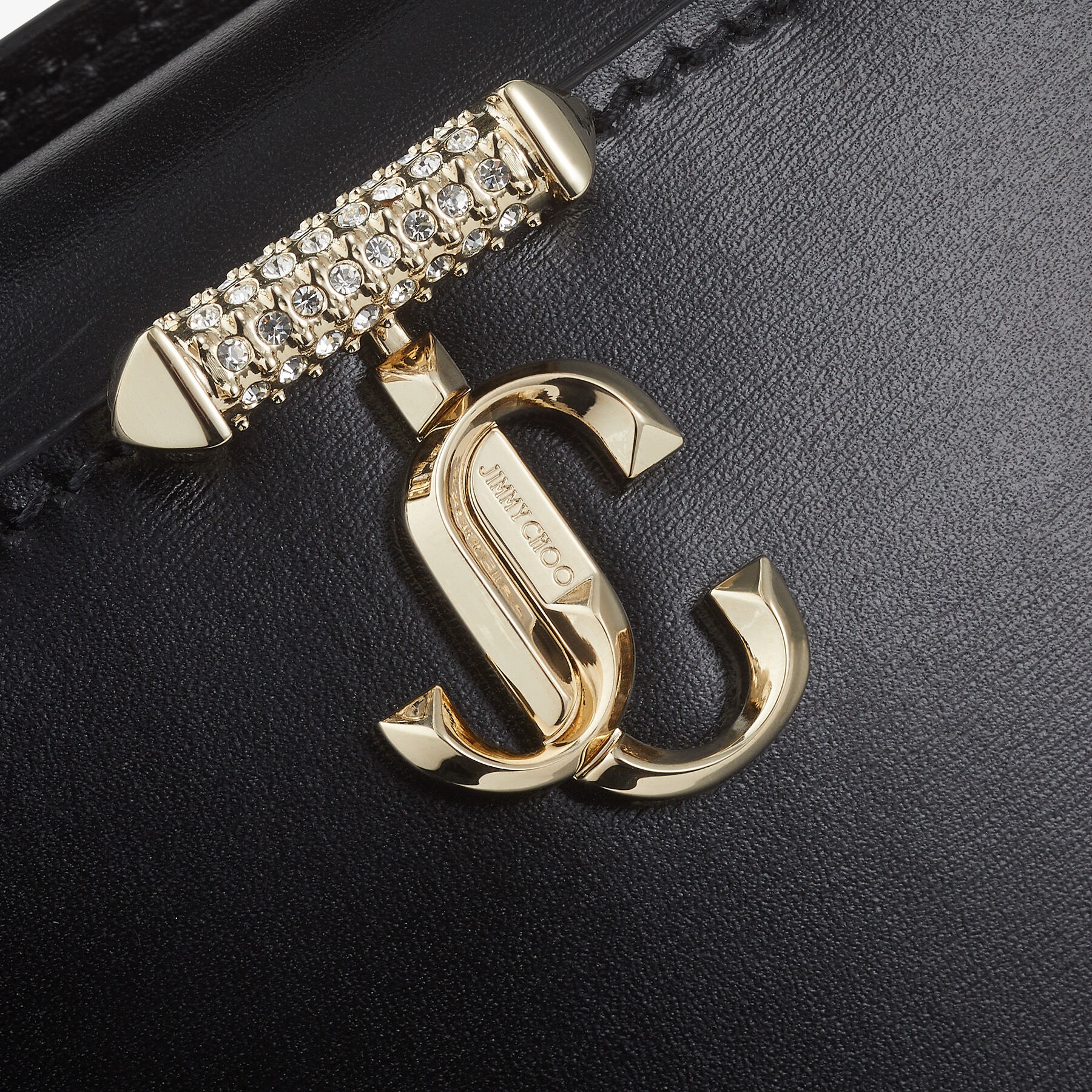 Varenne Top Handle Mini
Black Leather Top Handle Bag with Crystal Bar and JC Emblem - 7