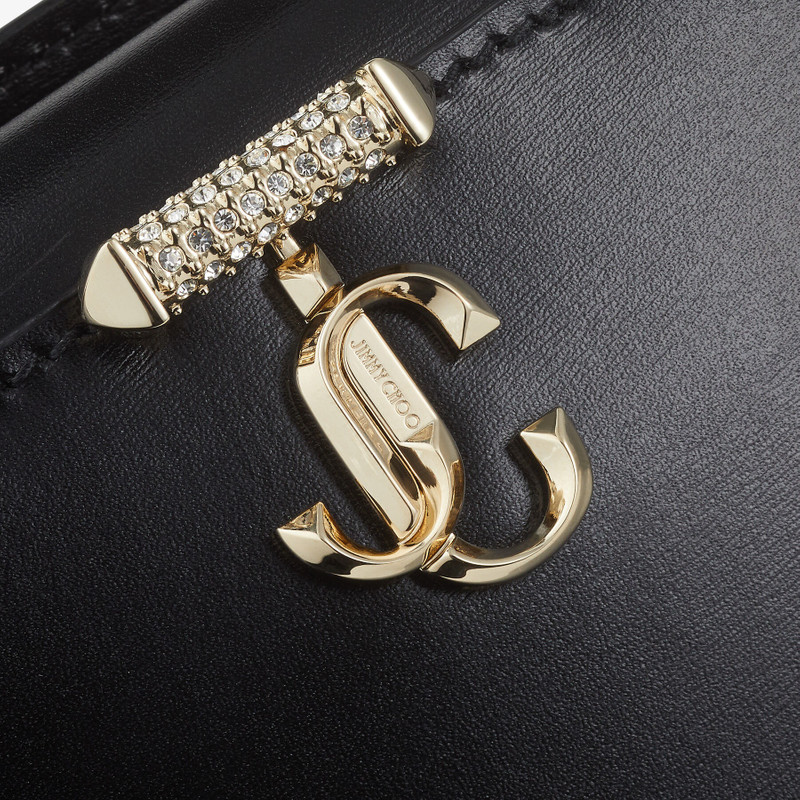 Varenne Top Handle Mini
Black Leather Top Handle Bag with Crystal Bar and JC Emblem 7