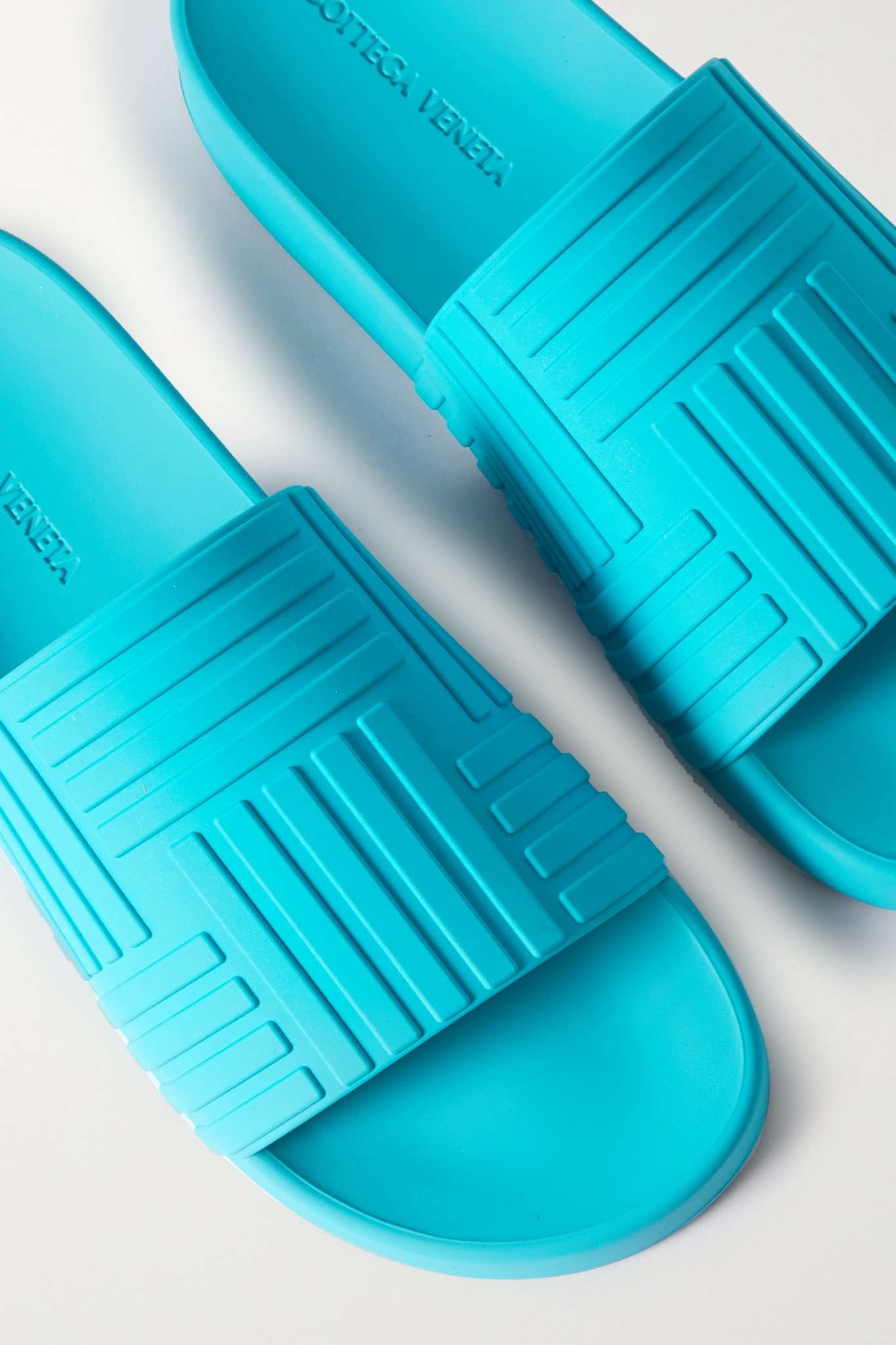 Embossed rubber slides - 4