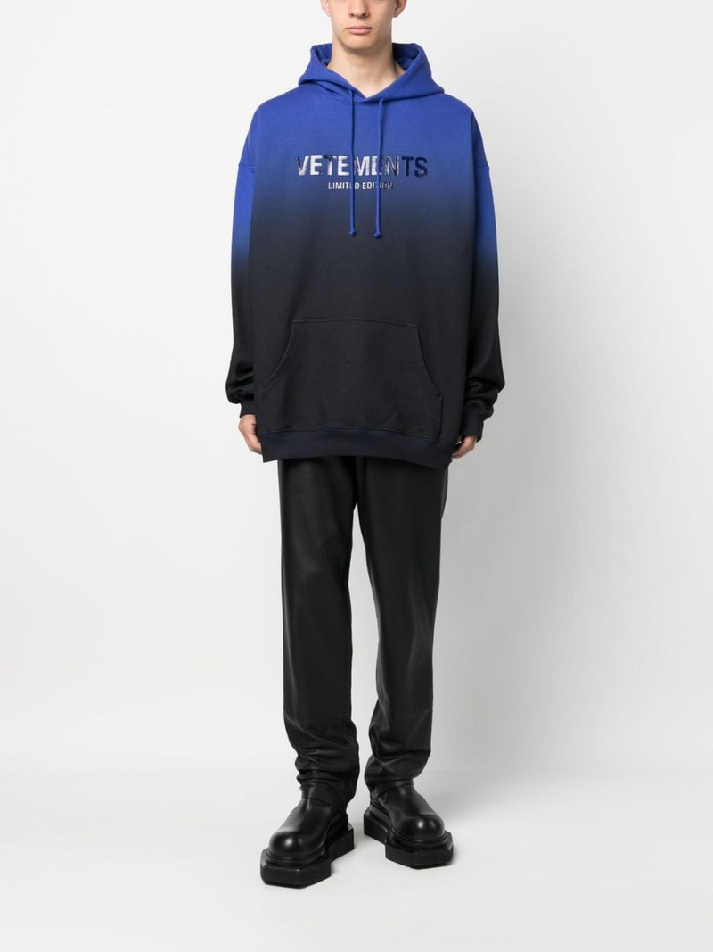 VETEMENTS logo-print faded-effect hoodie outlook