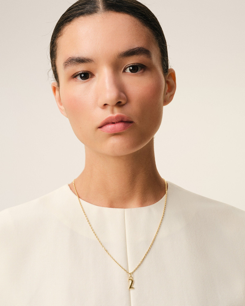 AMI Paris GOLD BRASS HAMMERED "2" PENDANT NECKLACE outlook