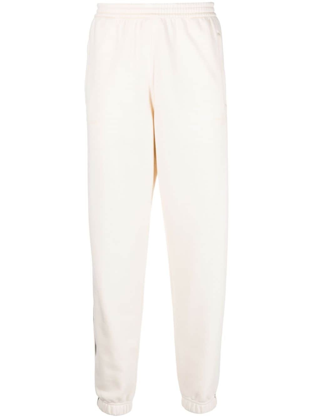 stripe-detail tapered track pants - 1