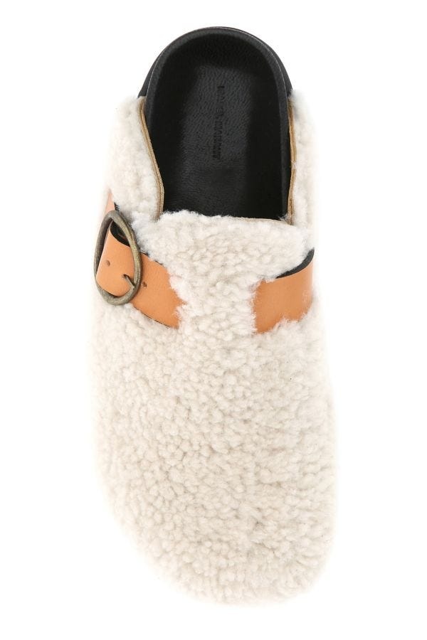 【送料&関税込】Isabel Marant Ivory Shearling Footb Slippers Isabel Marant Ivory Shearling Footb Slippers In Beige | ModeSens