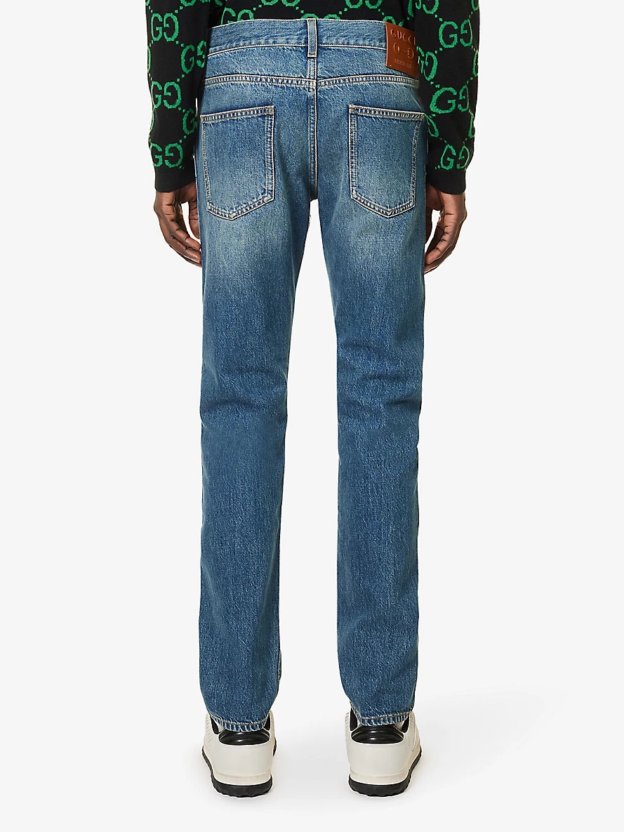Brand-patch faded-wash mid-rise tapered-leg jeans - 4