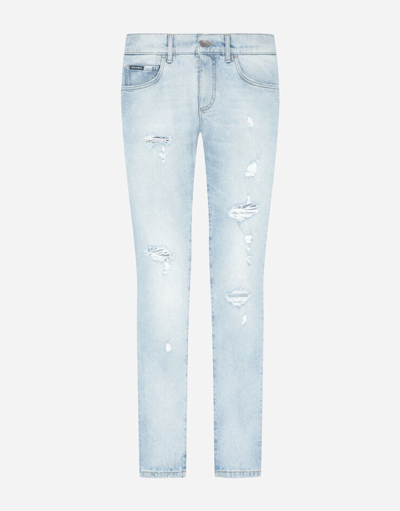 Light blue skinny stretch jeans with rips 1