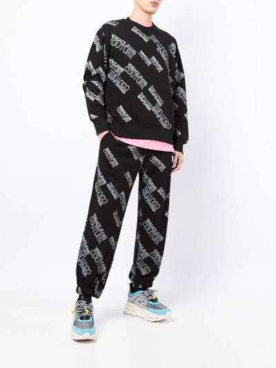 VERSACE JEANS COUTURE all-over logo track pants outlook