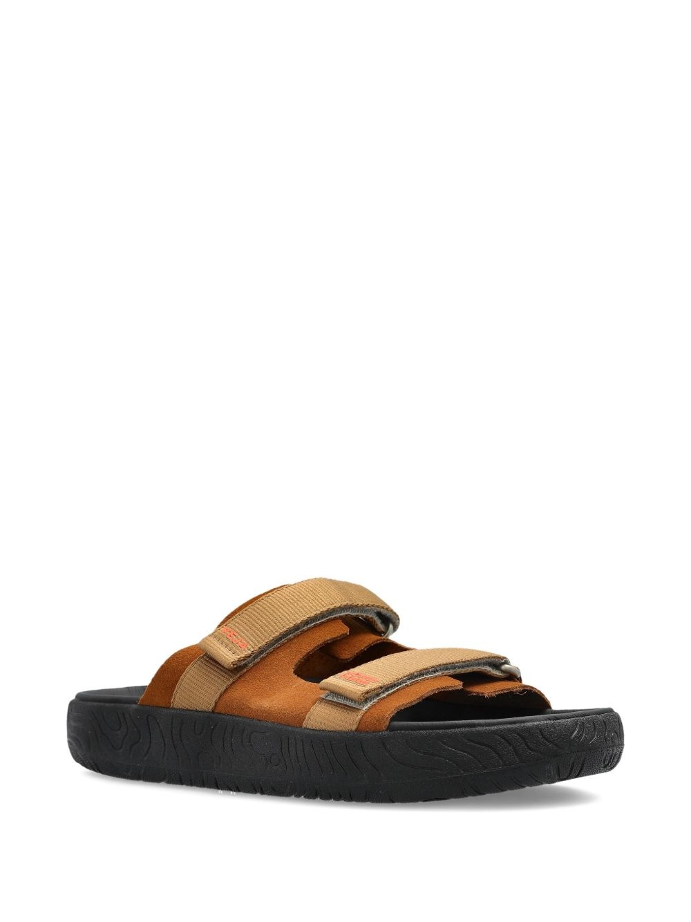 x Homecore logo-embellished slides - 2