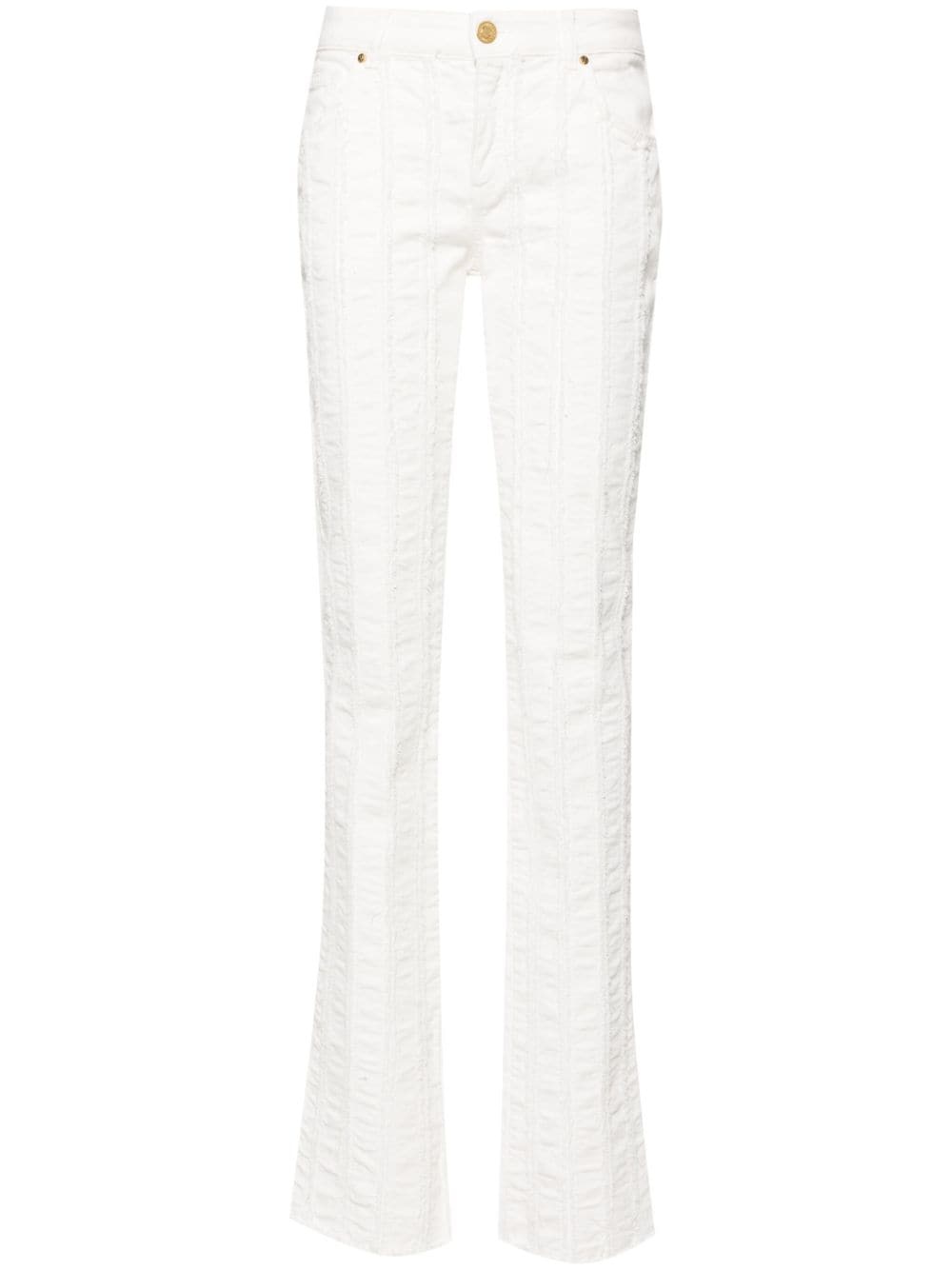 raw-cut detailed slim-leg trousers - 1