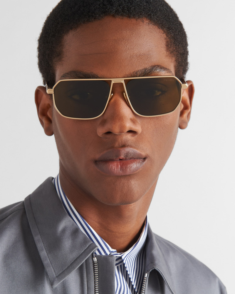 Prada Sunglasses with iconic metal plaque outlook