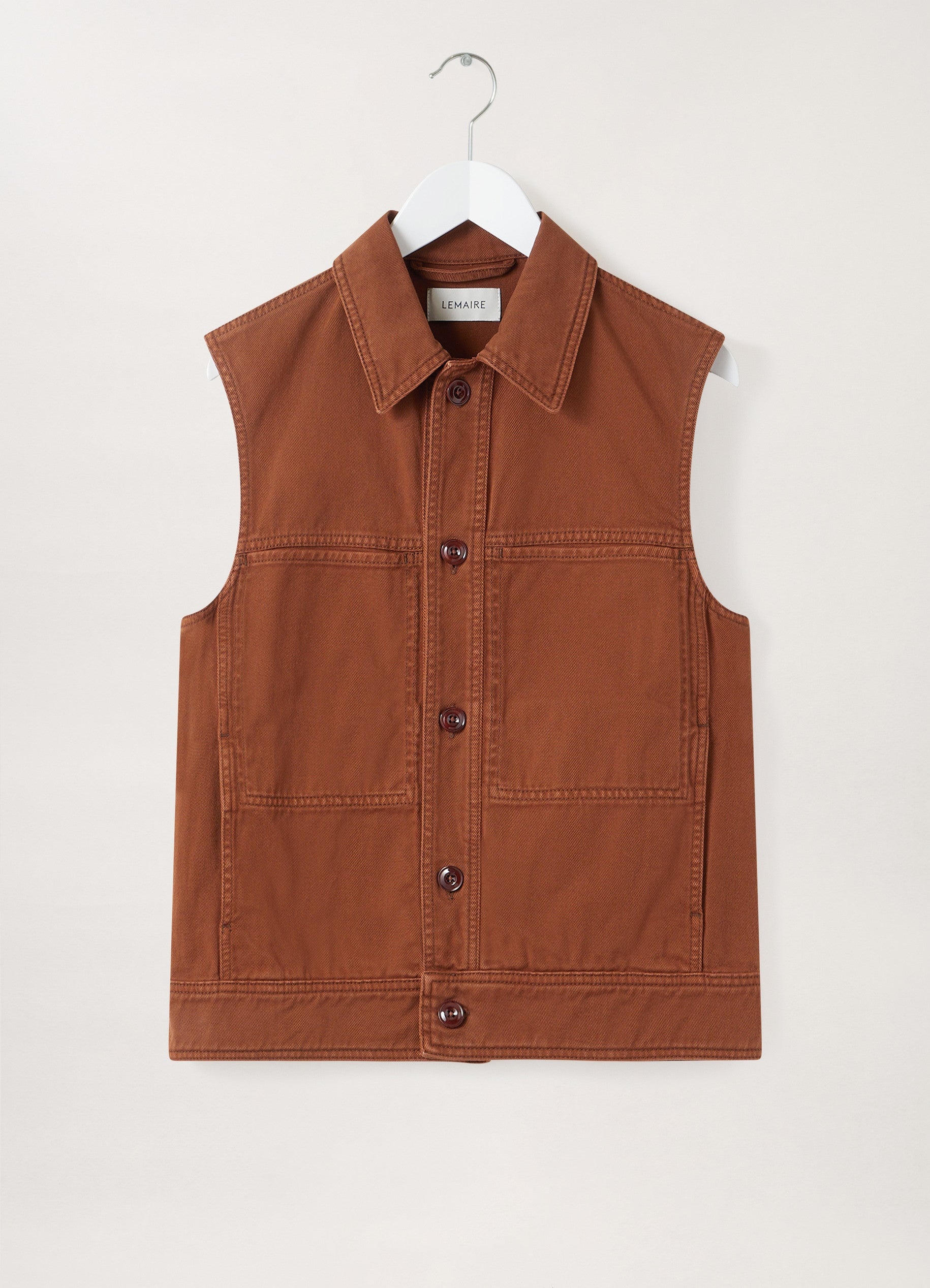 DENIM SLEEVELESS JACKET
GARMENT DYED DENIM - 1