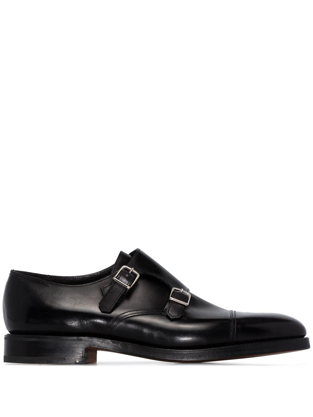 William lace-up in smooth black leather with double palladium finish buckle and double leather sole. - 1