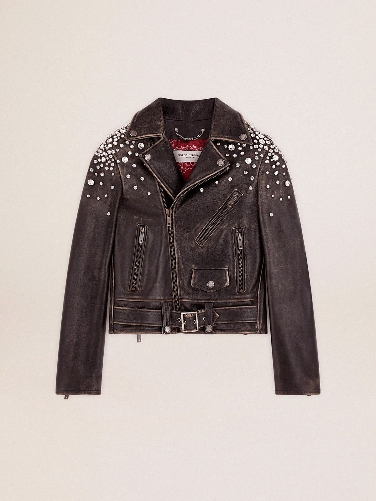 Women's biker jacket in distressed leather with cabochon crystals - 1
