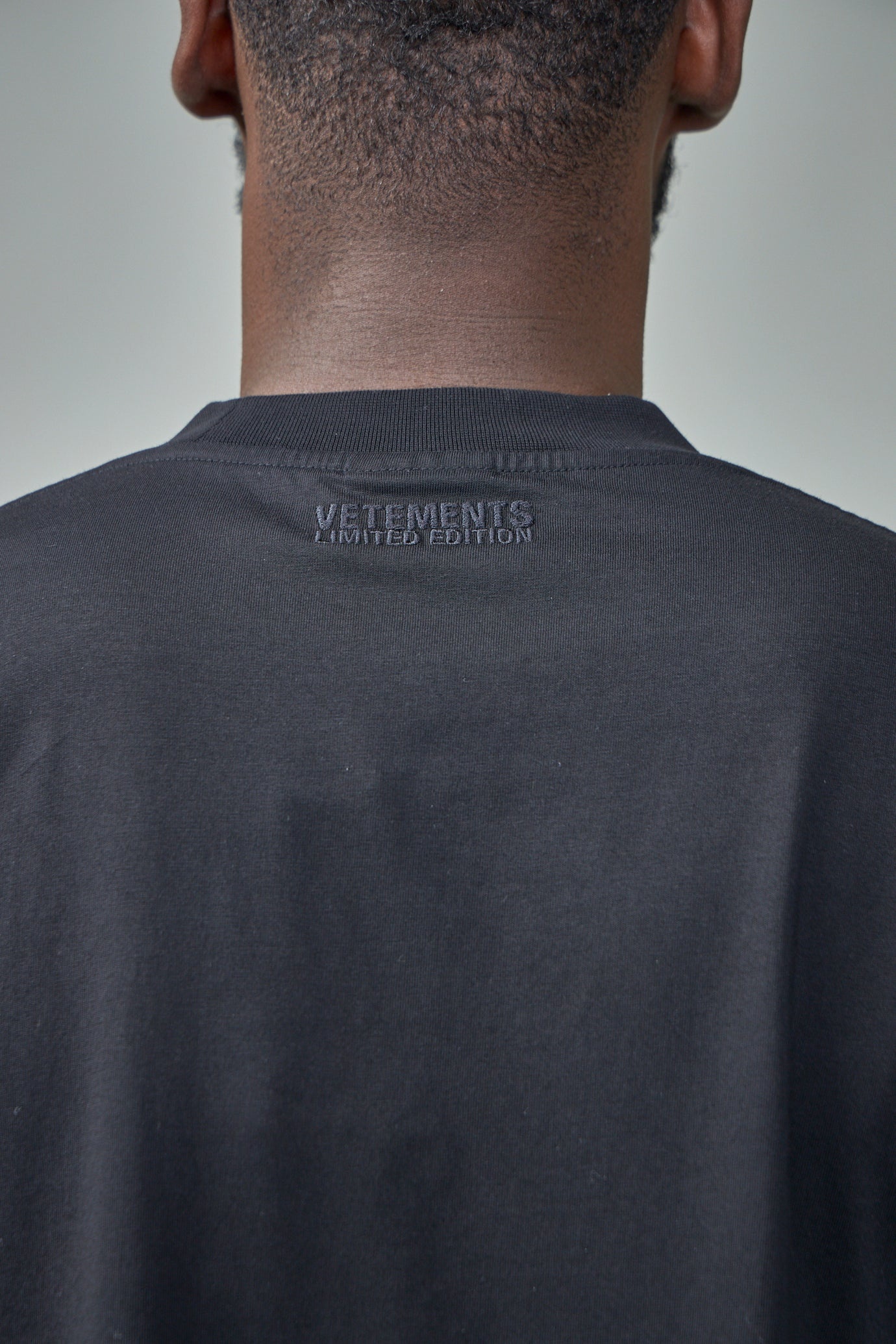 VETEMENTS Oval Logo Cropped Boxy T-Shirt | labelsfashion