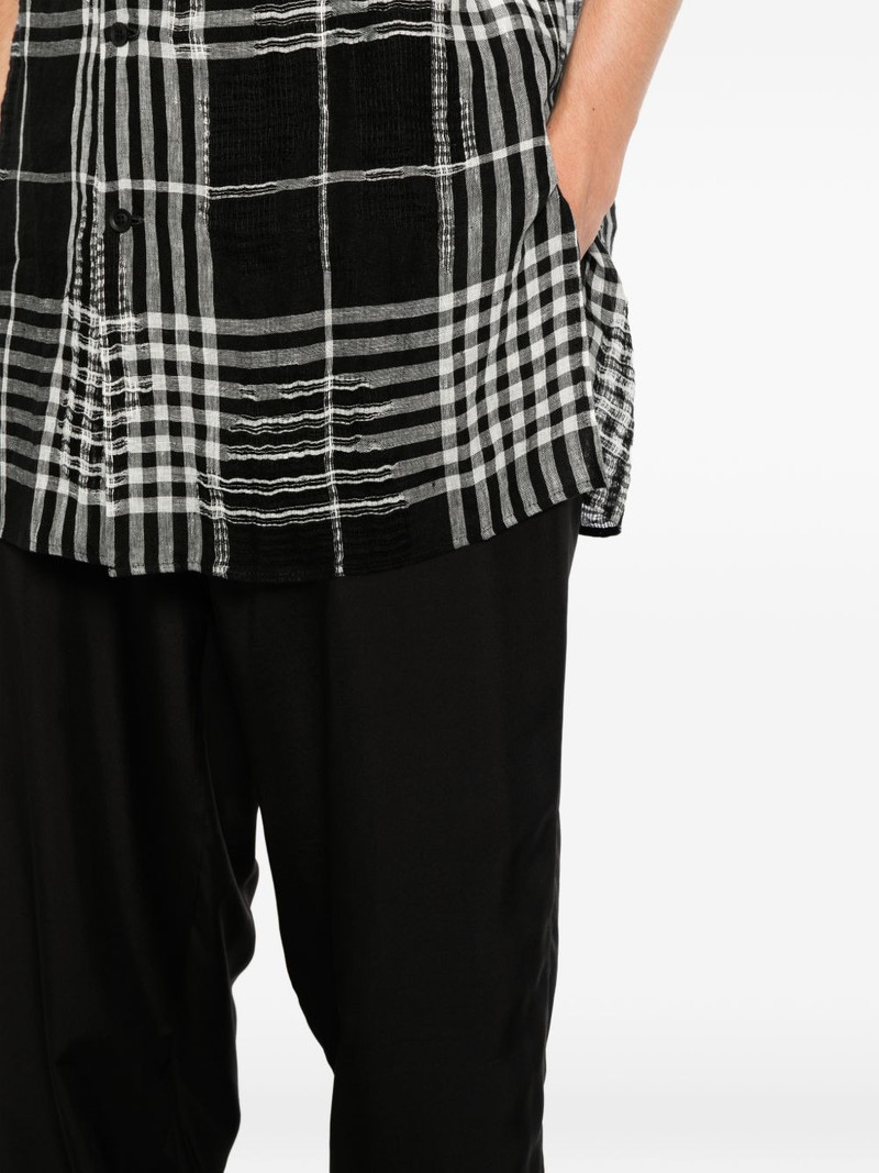 elasticated-waistband tapered trousers 5