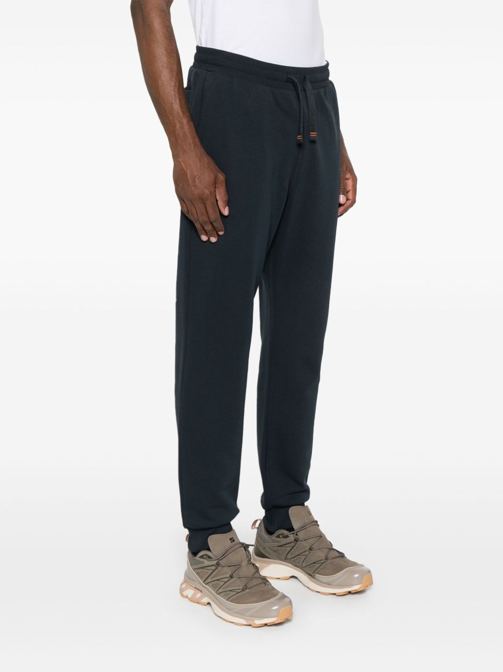 Makalu logo-appliqué tapered trousers - 3