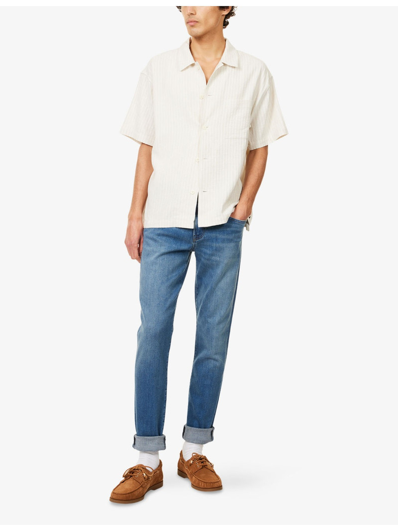 Citizens of Humanity London Brand-Patch Tapered-Leg Slim-Fit Stretch-Denim Jeans outlook