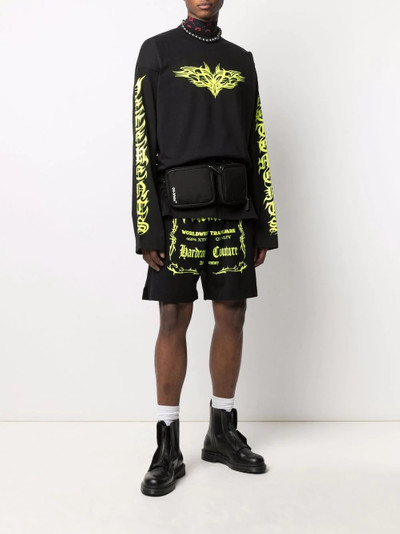 VETEMENTS logo graphic-print track shorts outlook