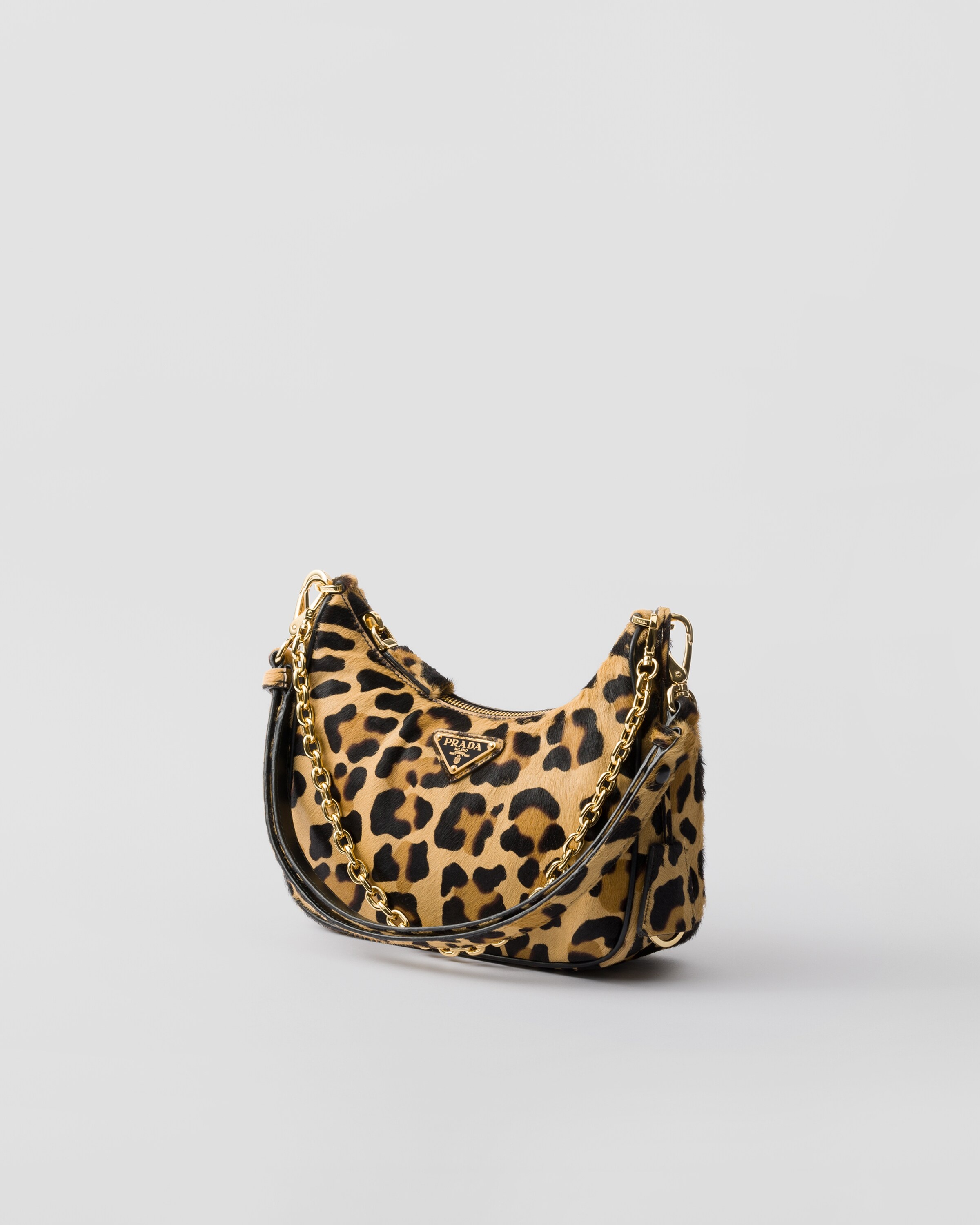 Prada Prada Re-Edition printed leather mini-bag | REVERSIBLE