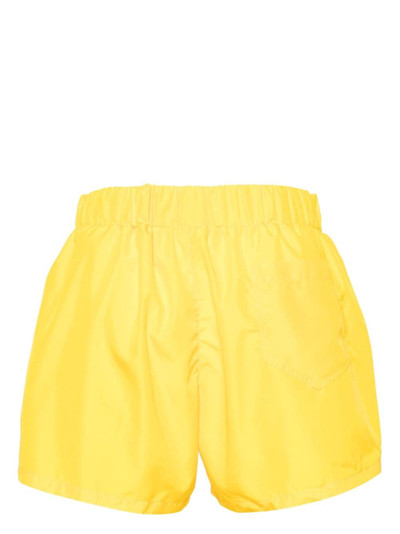 Moschino logo-embossed swim shorts outlook