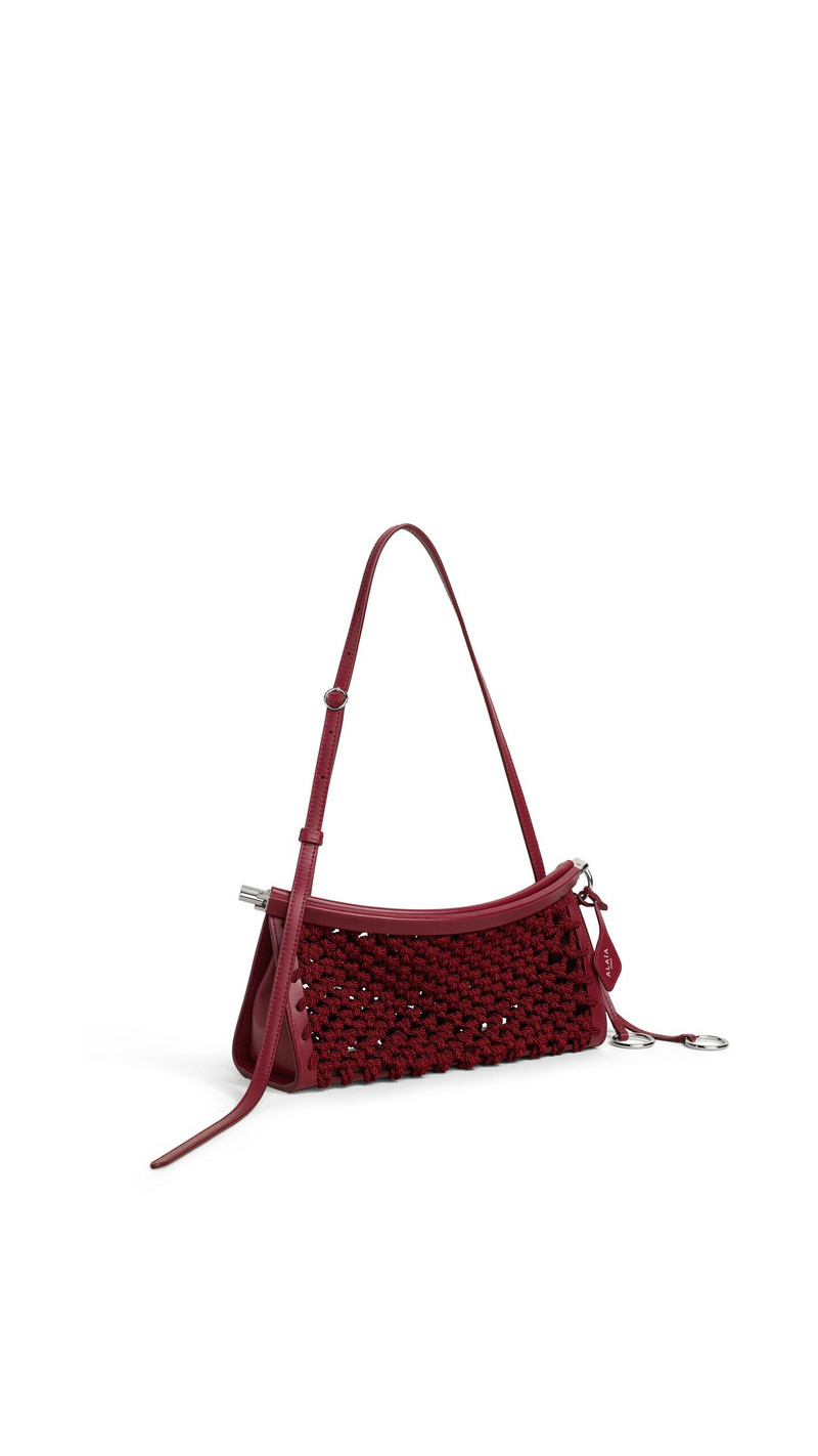 Alaïa LE CLICK EAST WEST SMALL BAG IN SATIN CORD outlook