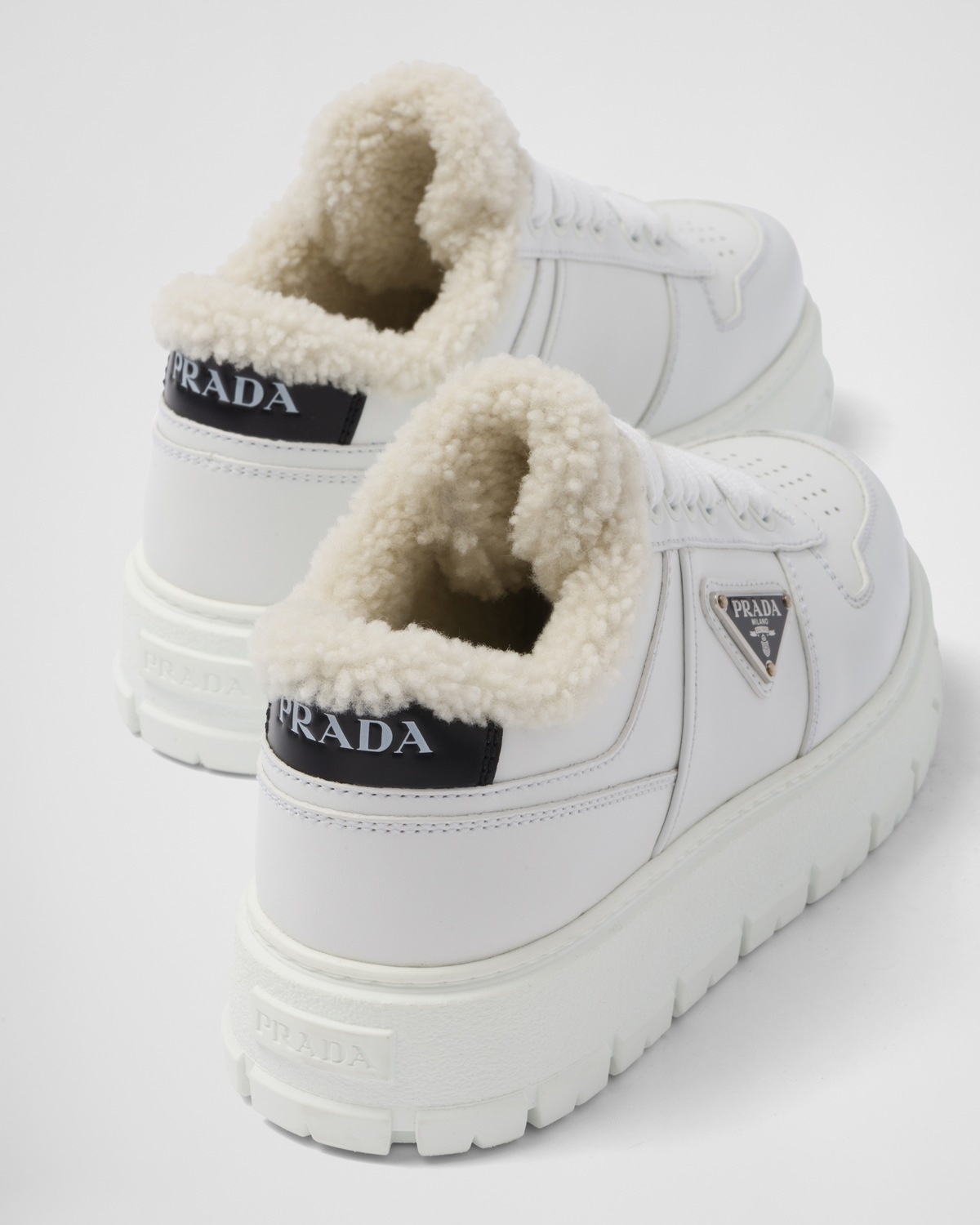 Leather and shearling sneakers - 7