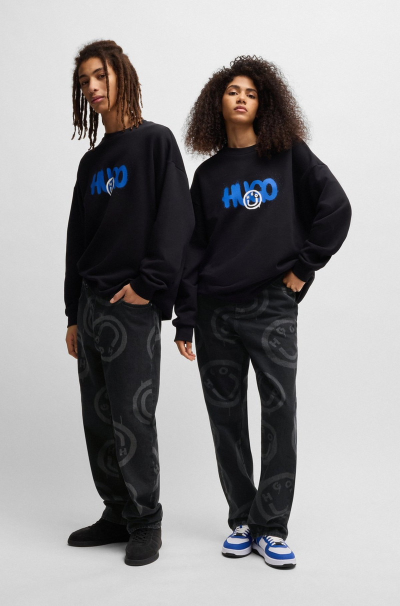 HUGO BLACK BAGGY-FIT JEANS WITH HAPPY HUGO PRINT outlook