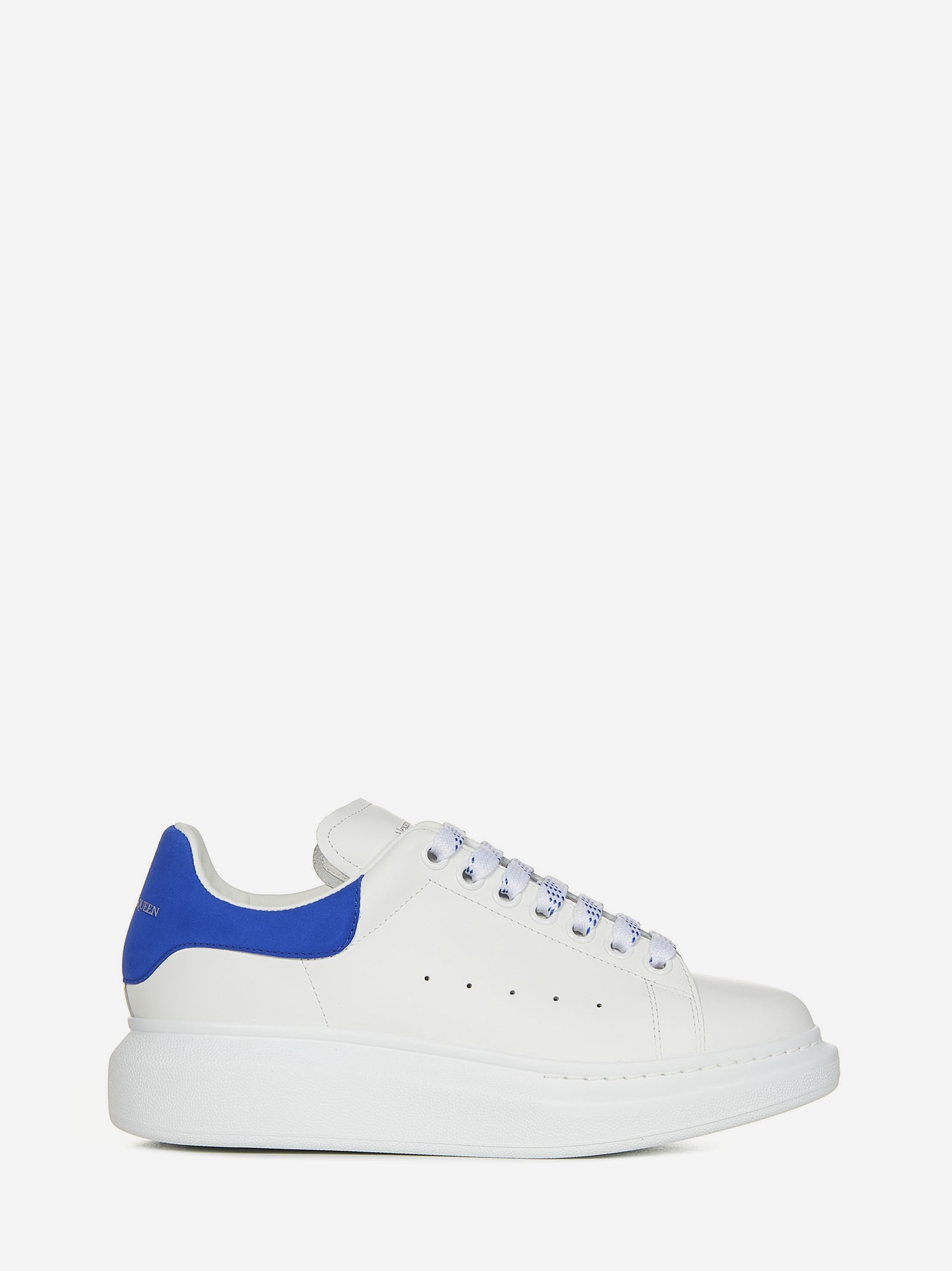 Oversize white smooth leather sneakers with electric blue suede detail on the heel. - 1
