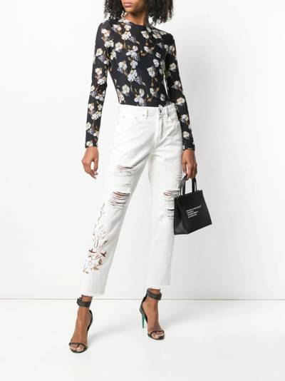 Off-White distressed flowers jeans outlook