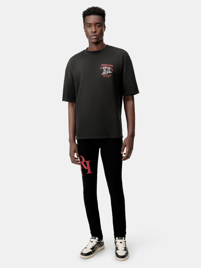 AMIRI STAGGERED LOGO SKINNY JEAN- Black Red outlook