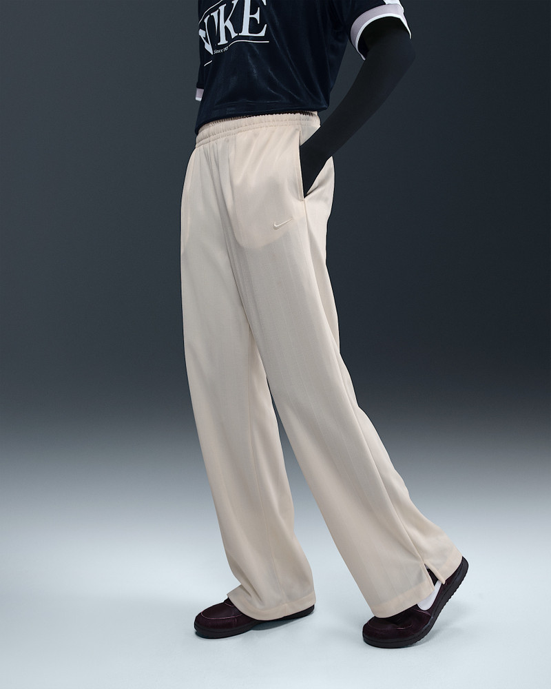 Nike Nike Sportswear Women's Mid-Rise Loose Jacquard Striped Track Pants outlook