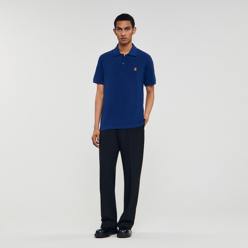 Sandro POLO SHIRT WITH LEATHER LOGO outlook