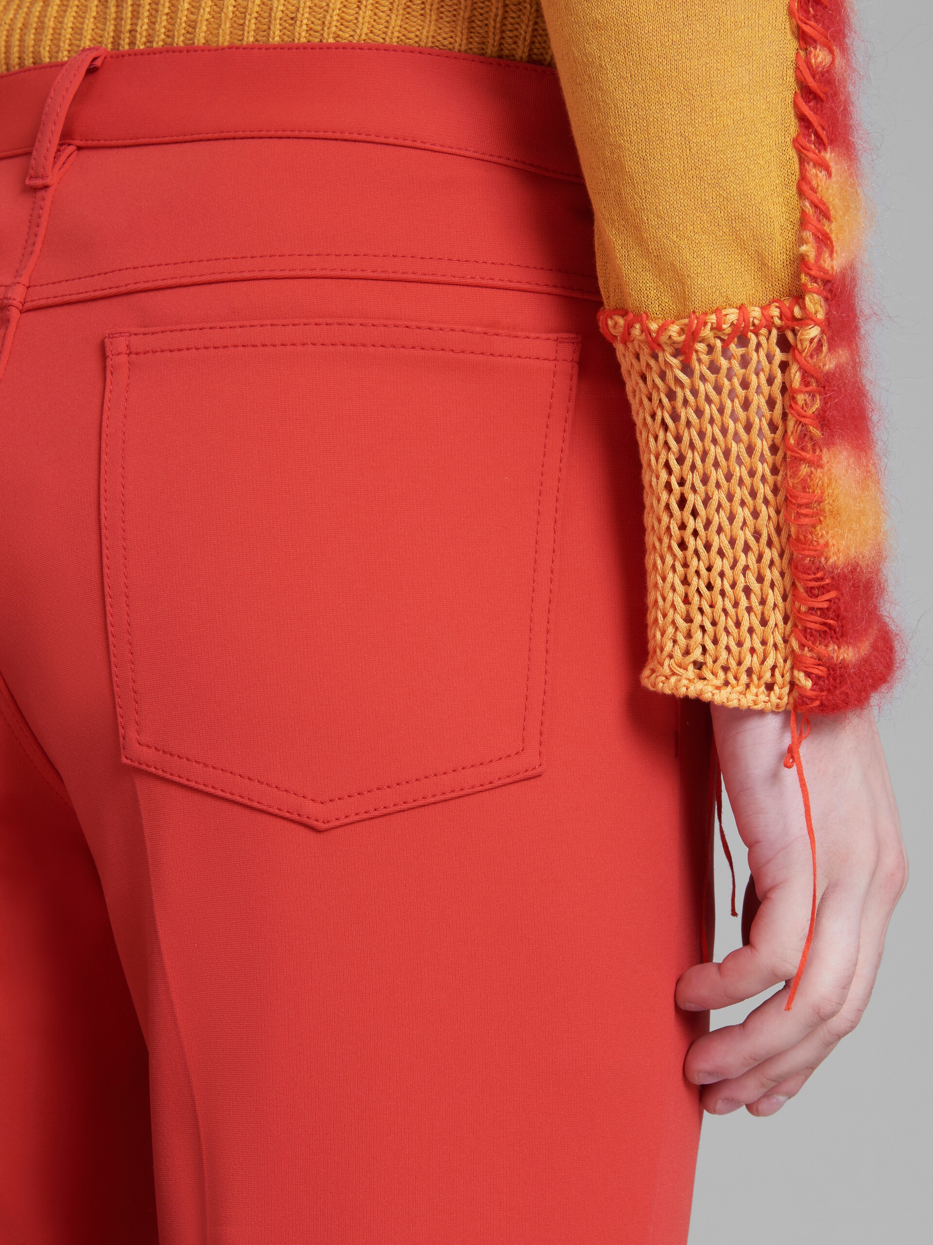 RED FLARED TROUSERS IN STRETCH JERSEY - 4