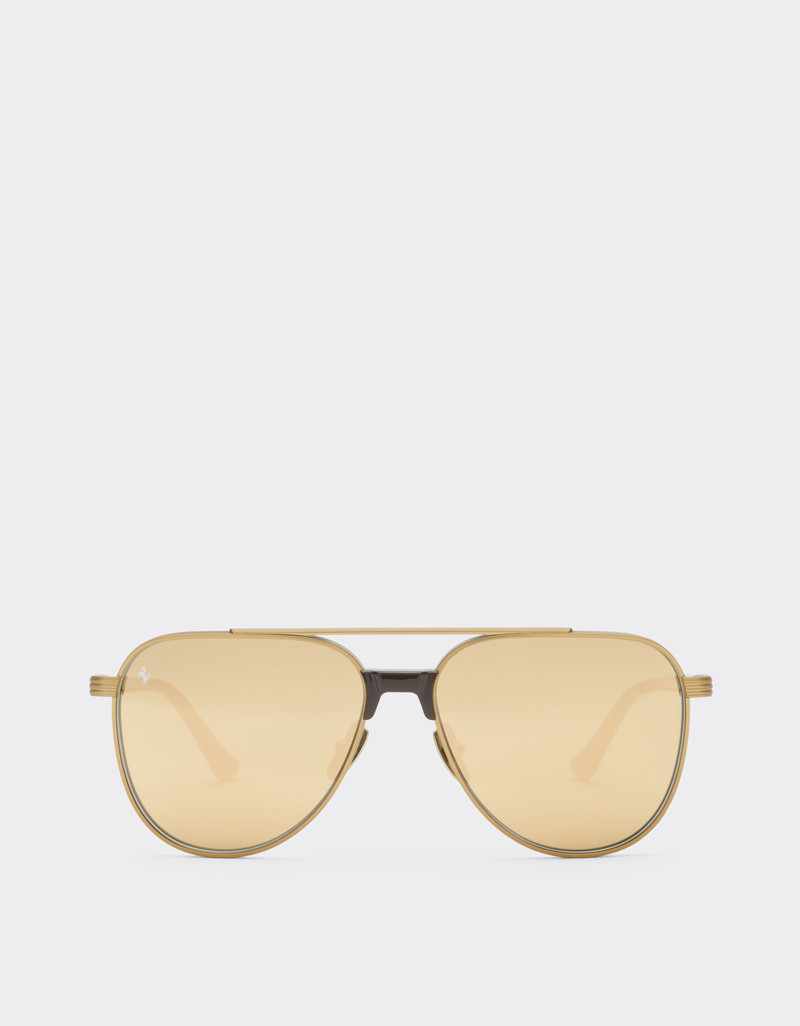 Ferrari sunglasses in matte gold titanium and acetate with transparent yellow-gold mirrored lenses 1