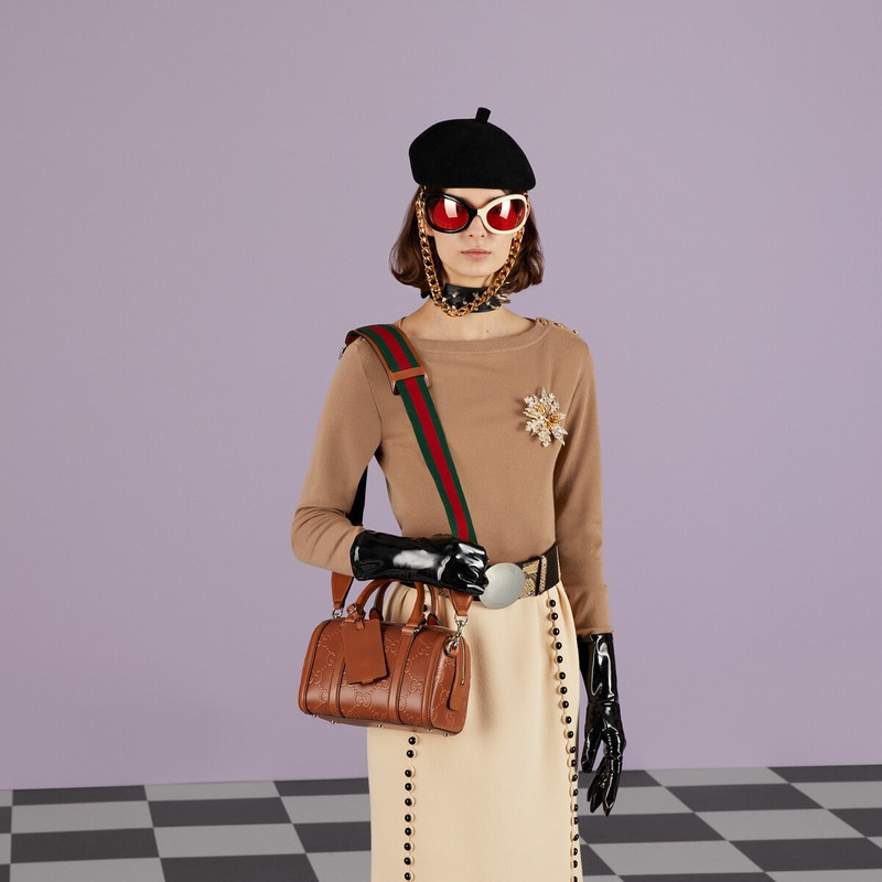 GG embossed mini duffle bag 4