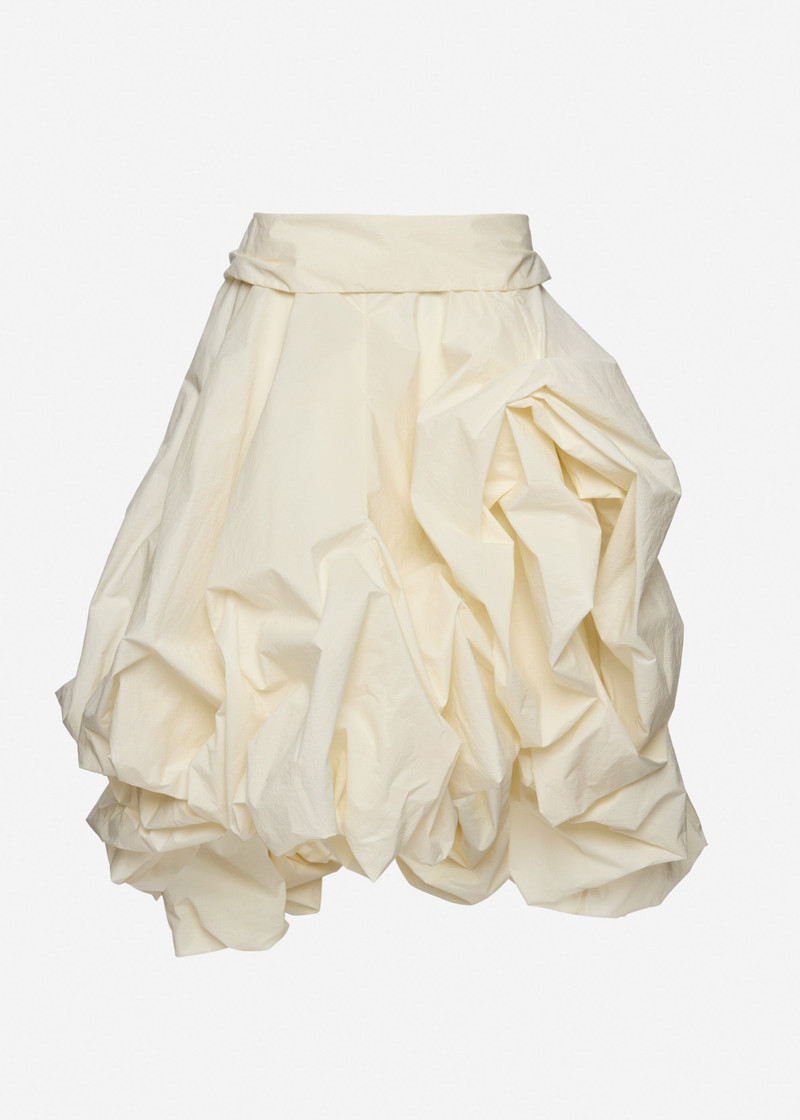 Draped skirt with sculptural volume in cream 1