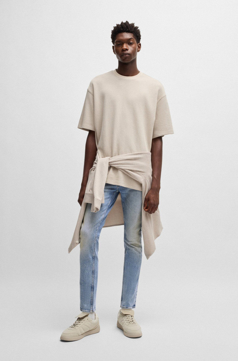 HUGO EXTRA-SLIM-FIT JEANS IN STONEWASHED BLUE STRETCH DENIM outlook